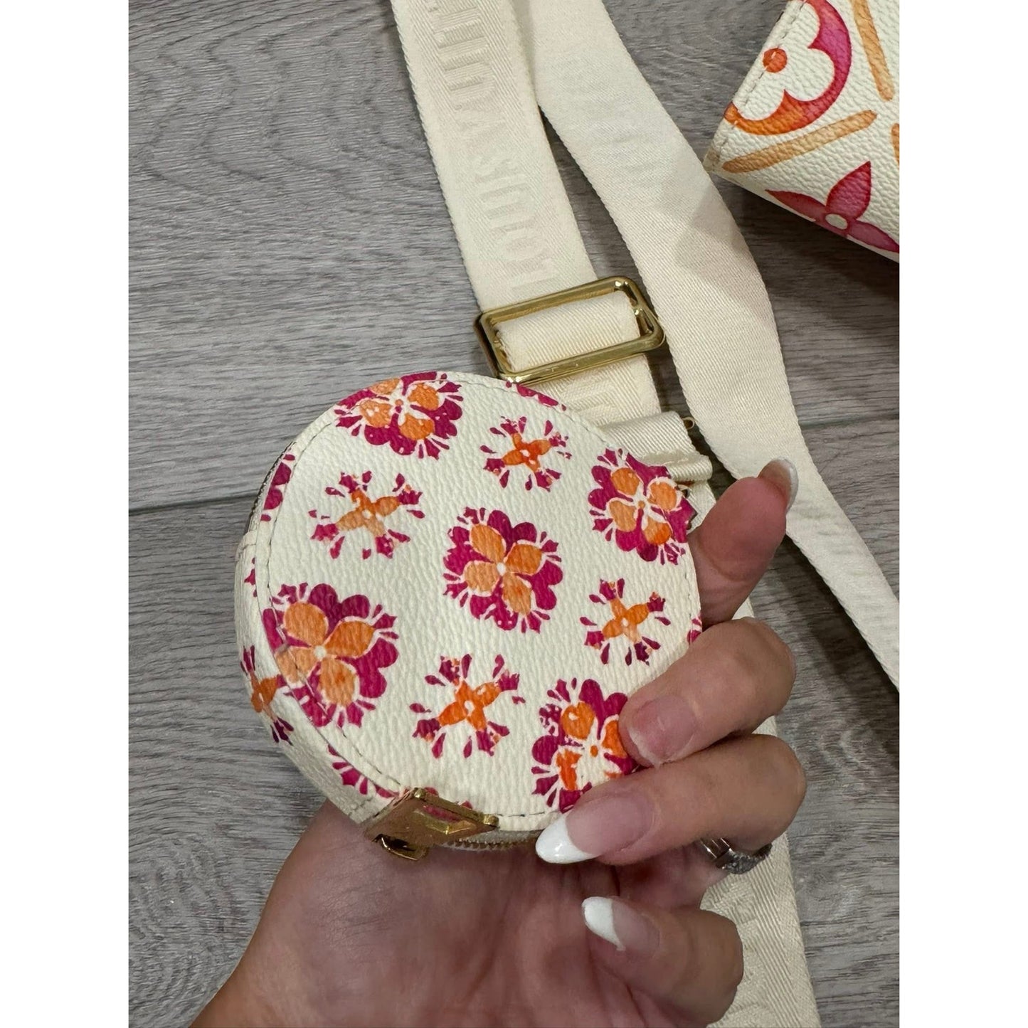 Lv On the go east west by the pool orange and pink