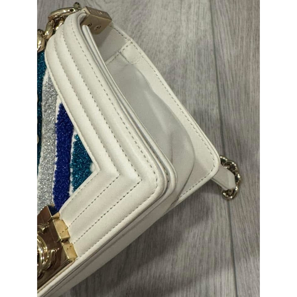 Chanel small chevron boy bag.