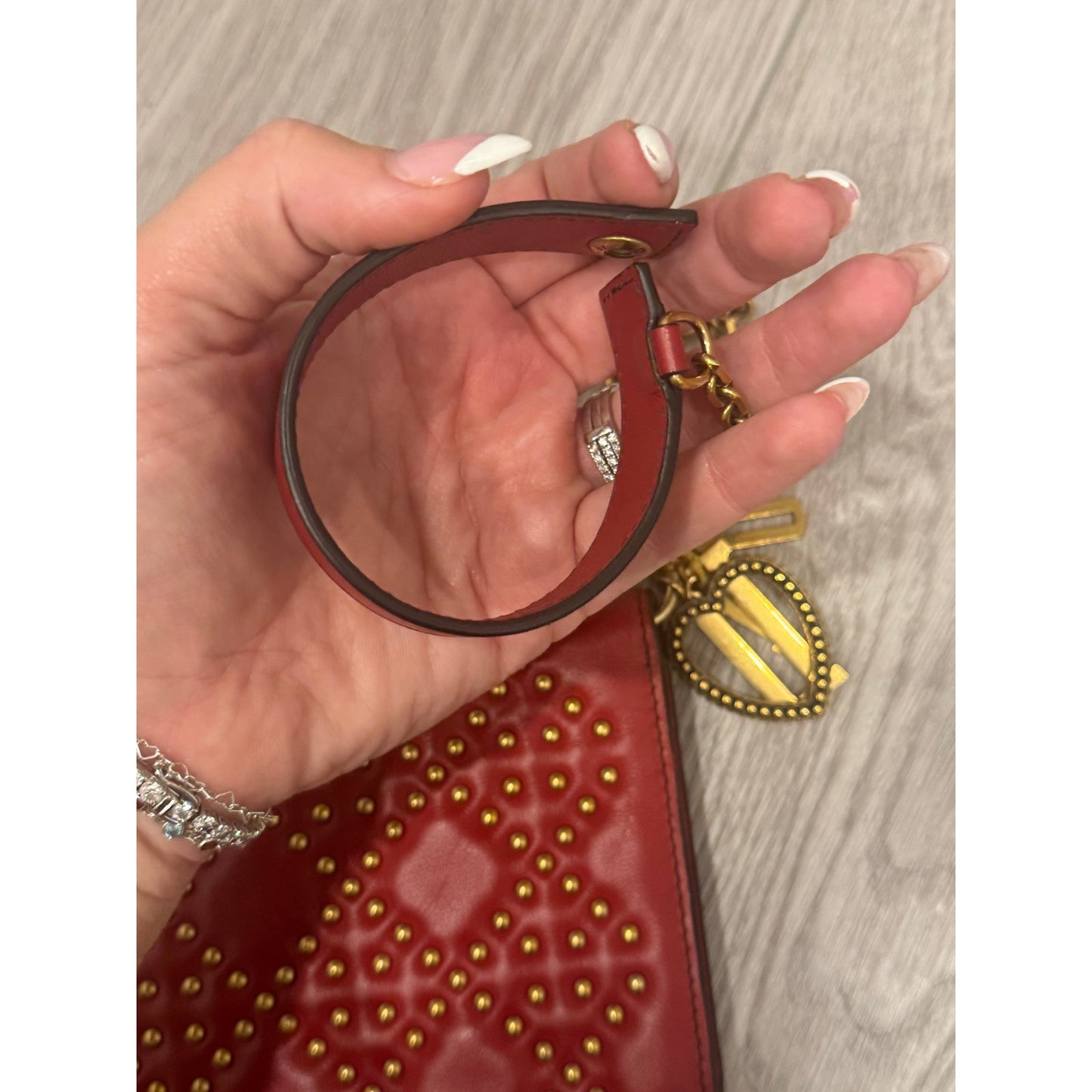 Dior wallet on a chain
