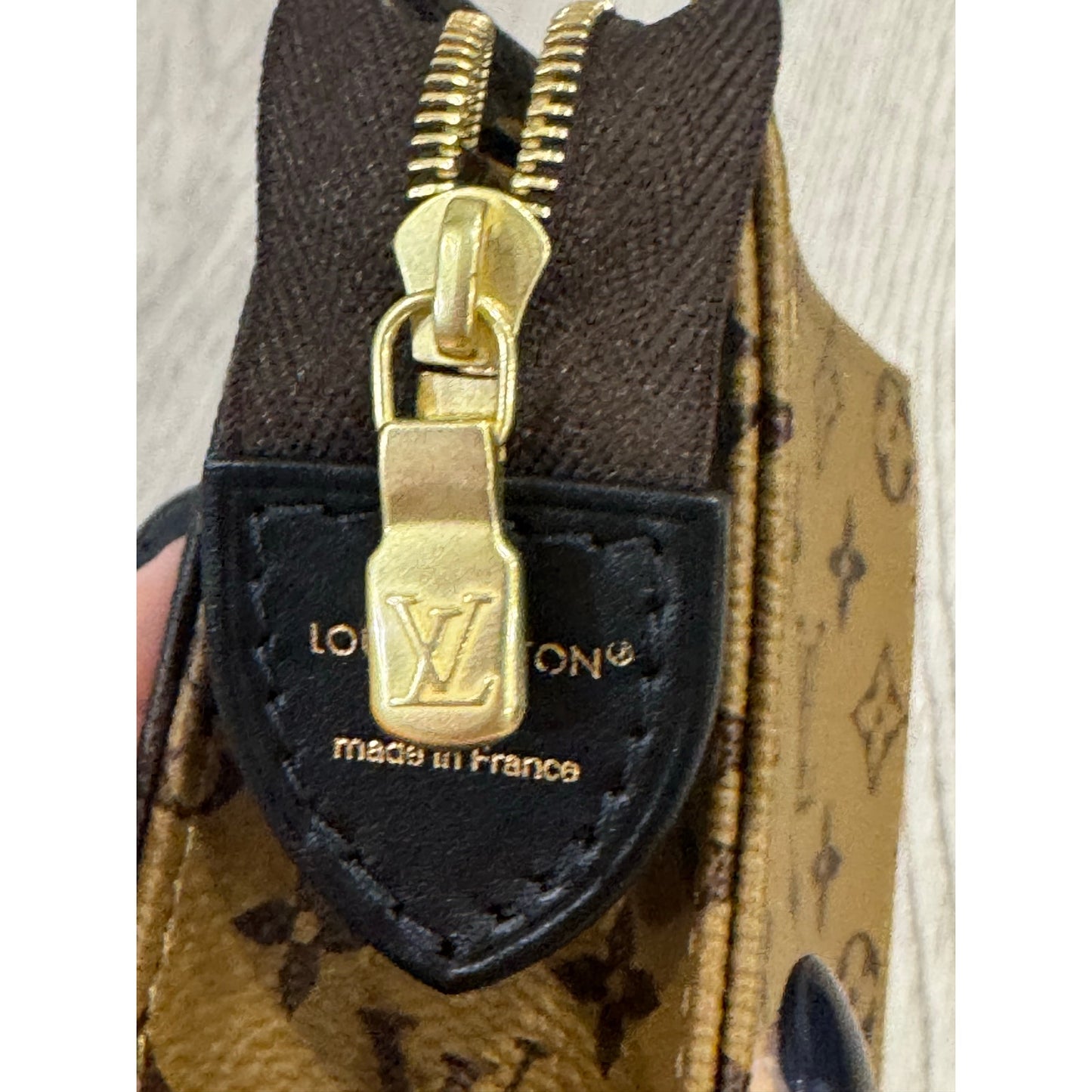Lv toiletry 19 reverse monogram